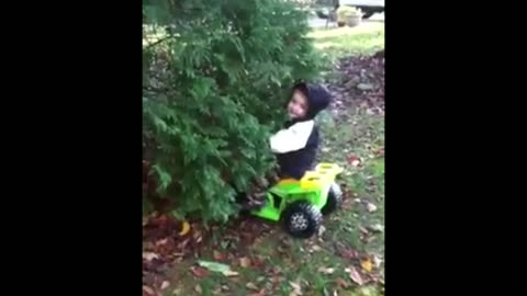 Toddler Drives Power Wheels Into Bush In Slow Crash