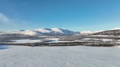 A Winter Landscape under a Clear Blue Sky