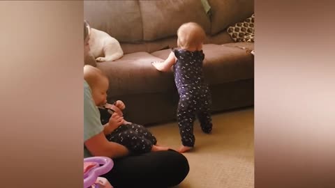 Cute baby are dancing with his mother