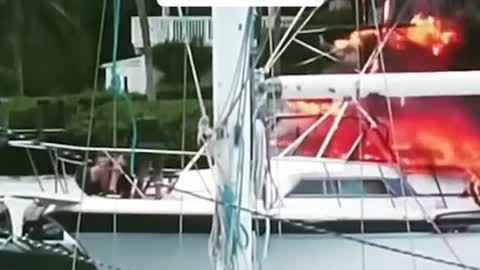 Police rescue unresponsive man on burning boat in Florida
