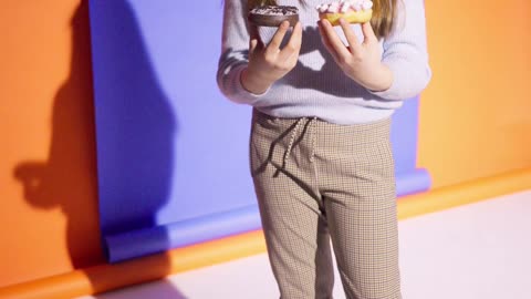 Girl Eating a Doughnut