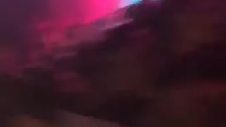 Music guy dancing at concert and shaking camera