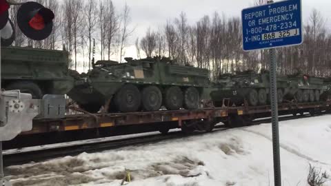 Train Transports Tons of Military Vehicles