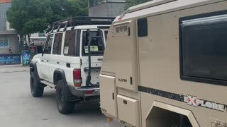 4K HD China domestic customer Pick up his unique sand color njstar rv off road camper trailer