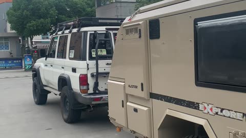4K HD China domestic customer Pick up his unique sand color njstar rv off road camper trailer