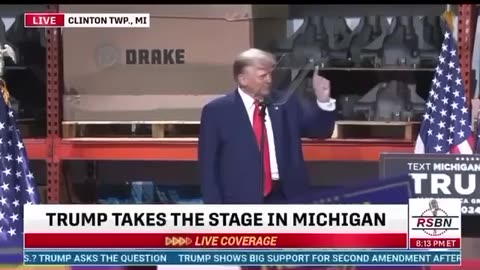 Trump draws Q in the air