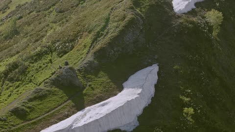 High Angle Footage Of A Mountain Peak With Snow Residue