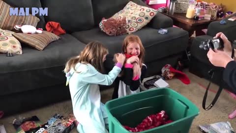 Kids getting surprised with puppies