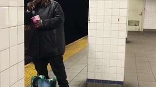 Guy eats out of tub with spoon in subway