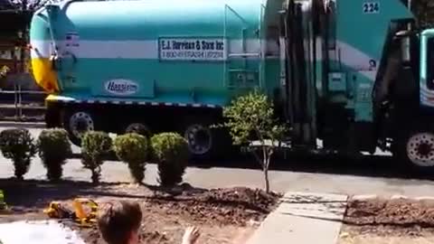 Garbage Man Brings Special Gift to Autistic Child