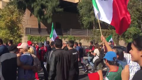 Tijuana residents march in protest of Central American migrants staying in city shelter
