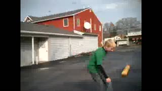Boy Crashes Skateboard On Homemade Ramp