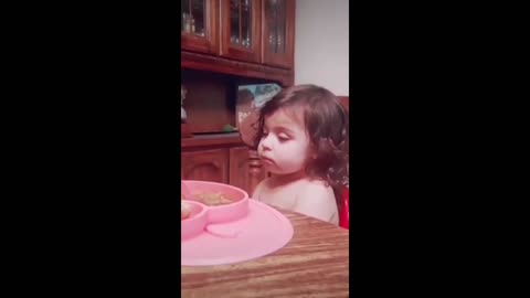 Tired Girl Falls Asleep at Dinner Table