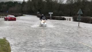Driving Motorcycles Through Floodwater