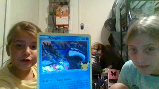 Kyla and Teagan show Opening Pokemon cards