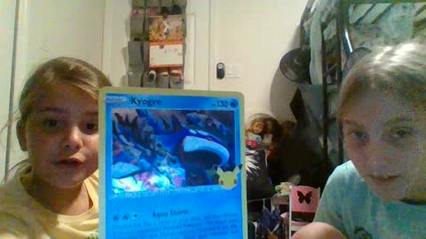 Kyla and Teagan show Opening Pokemon cards