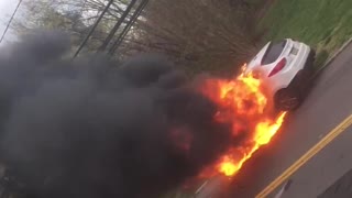 Car Burns Close to House
