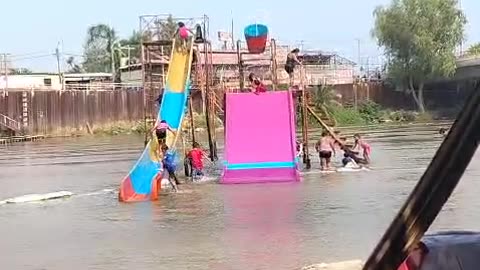 Woman Slips and Falls Down Stairs at Water Park