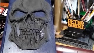 Sculpting a skull on an old Grays Anatomy book with Poly-Props Ltd Craft Foam Clay