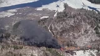 Train carrying potentially hazardous materials derailed and caught fire near Rockwood, Maine