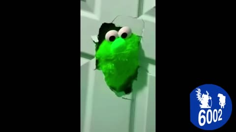 Elmo busting trough the door