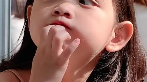 cute baby eating bread