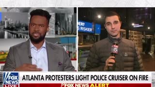 Atlanta protestors light police cruiser on Fire