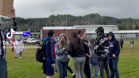 KIDS STANDING UP NO MORE MASKS