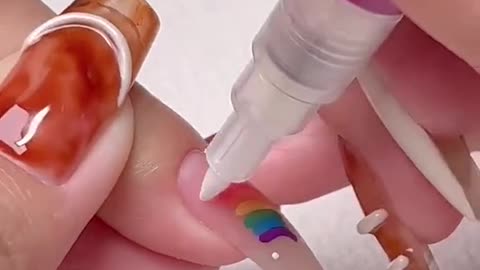 Draw a rainbow on your nails