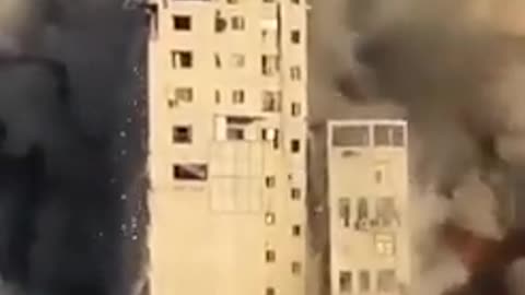 Israeli Air Strike - Building Collapses After Missile attack