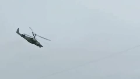 A Ka-52 striker at extremely low altitude in the sky over the LNR.