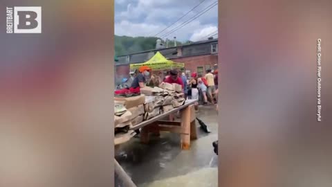 LOVE THY NEIGHBOR: Volunteers Help Clean Up Vermont Store After Flood