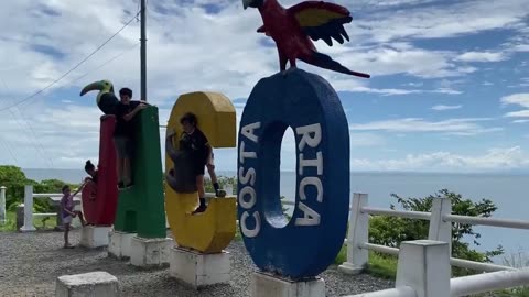 Stopping by the Jaco letters to take pics with the girls Costa Rica