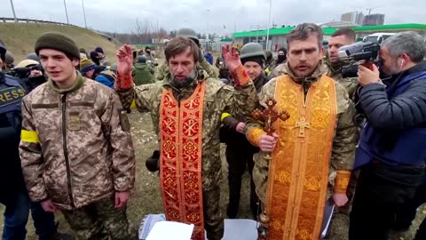 Ukrainian reservists' wedding lifts spirits in Kyiv