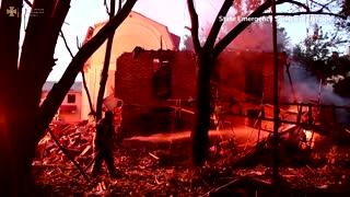 Russian shells burn residential building - Ukraine