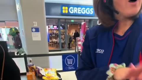 Tesco worker trying to snatch phone