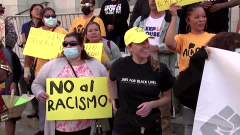 Anti-racism protestors rally outside LA City Hall
