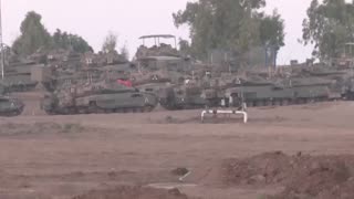 Israeli tanks continue to station at Gaza borders as ground invasion looms