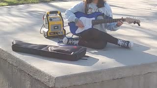 Guitar In the Park...A Random Bubble Floats By