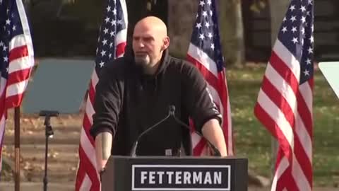 Watch as John Fetterman - flags are blown down behind him - God is trying to tell you something❗ 🤔