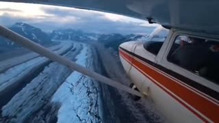 A pilot flies over the forbidden wall in Antarctica