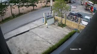 Young Boy Takes off on Tricycle with Baby Sister in Sidecar