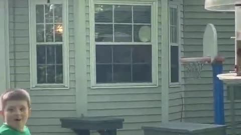 Kid Performs Amazing Trick Shot By Throwing Ball Into Basketball Hoop Through Roof