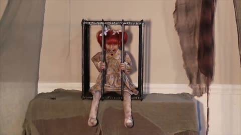 Animated Screaming Caged Kid Walk Around Accessory