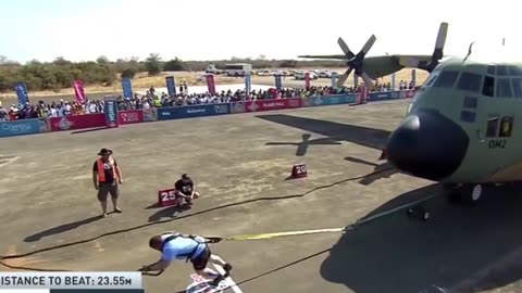 world strongest man pulling a military plane😱😱🤯