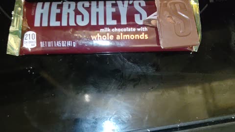 Eating Hershey's Milk Chocolate With Almonds, Dbn, MI, 3/17/24