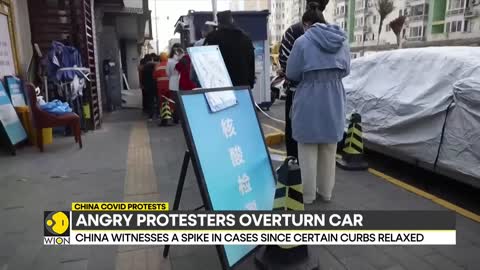 China COVID protests_ People break COVID barriers in Haizhu district _ World English News _ WION