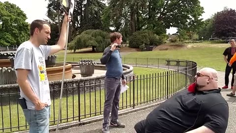 Atheist in a Wheelchair challenges a street preacher.