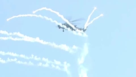 Zhi-20, Zhi-10 and Zhi-8L aircraft perform "Sky Girl Dispersing Flowers"