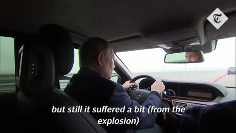 Putin drives a Mercedes across Kerch Bridge in Crimea weeks after explosion